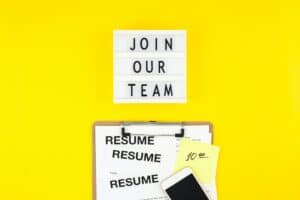 Join our team flat lay on yellow background